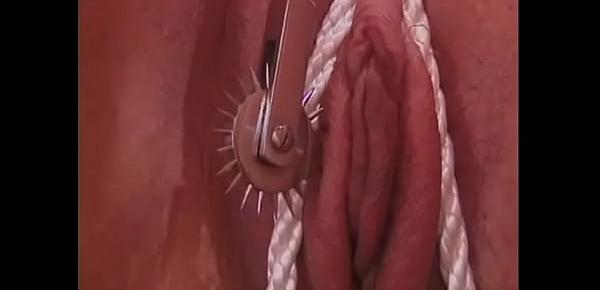  Black girl gets a rope in her pussy and a nipple blade treatment from mature dom